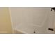 Clean bathroom featuring a full tub with a shower at 549 E Mckellips Rd # 18, Mesa, AZ 85203
