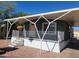 Charming single-Gathering home with covered front porch and a cheerful flower pot at 549 E Mckellips Rd # 18, Mesa, AZ 85203