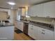 Spacious and bright kitchen featuring modern appliances, granite countertops, and ample counter space at 549 E Mckellips Rd # 18, Mesa, AZ 85203