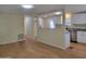 Bright and open living area with hardwood floors and seamless flow to the modern kitchen at 549 E Mckellips Rd # 18, Mesa, AZ 85203