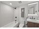 Updated bathroom featuring a bathtub, subway tile and black fixtures at 5815 N 10Th Pl, Phoenix, AZ 85014
