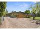 Charming home featuring a brick driveway and a modern horizontal wood fence at 5815 N 10Th Pl, Phoenix, AZ 85014