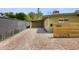 The exterior features a spacious brick driveway leading to the covered parking area at 5815 N 10Th Pl, Phoenix, AZ 85014