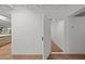 Hallway with white walls and open door at 5815 N 10Th Pl, Phoenix, AZ 85014