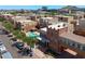 Captivating aerial perspective showcasing community pool and upscale townhome exteriors with desert mountain views at 625 S Roosevelt St, Tempe, AZ 85281