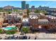 Stunning aerial view of modern townhomes and community pool nestled in a vibrant urban setting, perfect for city living at 625 S Roosevelt St, Tempe, AZ 85281