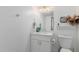 Bathroom with white vanity, updated fixtures and decorative wall art at 6350 N 78Th St # 280, Scottsdale, AZ 85250