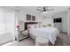 Bedroom with neutral decor, plush carpet, ceiling fan, and ample natural light at 6350 N 78Th St # 280, Scottsdale, AZ 85250