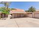 Charming single-story home with a terracotta tile roof and neutral-colored stucco exterior at 6350 N 78Th St # 280, Scottsdale, AZ 85250
