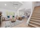 Bright living room with vaulted ceilings, white walls, hardwood floors, and large windows at 6350 N 78Th St # 280, Scottsdale, AZ 85250