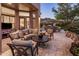 Inviting back patio with outdoor seating and BBQ area, perfect for entertaining guests at 6767 E Nightingale Star Cir, Scottsdale, AZ 85266
