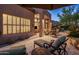 Cozy back patio featuring comfortable lounge chairs, scenic views, and a relaxing ambiance at 6767 E Nightingale Star Cir, Scottsdale, AZ 85266