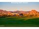 Scenic golf course with vibrant green grass and breathtaking mountain views at 6767 E Nightingale Star Cir, Scottsdale, AZ 85266