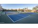 Outdoor pickleball courts offer recreational amenities with scenic desert views and mountain backdrop at 6767 E Nightingale Star Cir, Scottsdale, AZ 85266