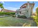 Bright home exterior boasts a large backyard and lush desert landscaping at 6841 S Roosevelt St, Tempe, AZ 85283