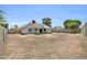 Expansive backyard features a blank canvas for outdoor living and customization, enclosed by a block fence at 7114 W Yucca St, Peoria, AZ 85345