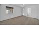 Bedroom with neutral carpet, ceiling fan, and a window at 7114 W Yucca St, Peoria, AZ 85345