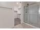 Bright bathroom features a glass shower and view into the walk-in closet at 716 W Blue Ridge Dr, San Tan Valley, AZ 85140