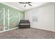 Charming Bedroom featuring a crib, natural light, and custom wall decor, creating a cozy and inviting space at 716 W Blue Ridge Dr, San Tan Valley, AZ 85140