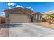 Beautiful home with two car garage and a driveway at 716 W Blue Ridge Dr, San Tan Valley, AZ 85140
