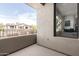 Cozy balcony with a view of the neighborhood and access to natural light indoors at 7445 E Eagle Crest Dr # 1145, Mesa, AZ 85207