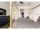 Bright bedroom featuring a four-poster bed, dark wood floors, dresser, walk in closet and ensuite bathroom at 7445 E Eagle Crest Dr # 1145, Mesa, AZ 85207