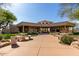 Community clubhouse exterior with inviting patio area and seating, perfect for gatherings at 7445 E Eagle Crest Dr # 1145, Mesa, AZ 85207