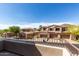 Community balcony view with well-maintained landscaping and neighborhood homes at 7445 E Eagle Crest Dr # 1145, Mesa, AZ 85207