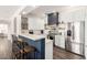 Charming kitchen with stainless steel appliances, modern finishes, and a breakfast bar for casual dining at 7445 E Eagle Crest Dr # 1145, Mesa, AZ 85207