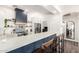 Inviting kitchen area with sleek counters, barstool seating, and stainless steel appliances for modern living at 7445 E Eagle Crest Dr # 1145, Mesa, AZ 85207