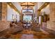 Elegant lobby with soaring ceilings, stone accents, and comfortable seating areas at 7445 E Eagle Crest Dr # 1145, Mesa, AZ 85207