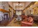 Grand lobby featuring stone fireplace, high ceilings, elegant furnishings, and an inviting atmosphere for residents and guests at 7445 E Eagle Crest Dr # 1145, Mesa, AZ 85207