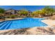 Resort-style pool offers community seating and lush landscaping at 7445 E Eagle Crest Dr # 1145, Mesa, AZ 85207