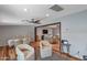 Open-concept living space featuring hardwood floors and a view of the dining area and living room at 7643 E Rancho Vista Dr, Scottsdale, AZ 85251