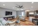 Bright and inviting living room with fireplace, modern furnishings, and an open layout at 7643 E Rancho Vista Dr, Scottsdale, AZ 85251