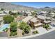 Expansive desert property showcasing lush landscaping, private backyard pool, and mountain views at 768 E Mountain Sky Ave, Phoenix, AZ 85048