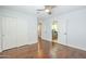 Bright bedroom with hard wood floors, access to the bathroom, and a closet at 768 E Mountain Sky Ave, Phoenix, AZ 85048