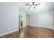 Spacious bedroom features hardwood floors and neutral walls, plus access to an ensuite bathroom at 768 E Mountain Sky Ave, Phoenix, AZ 85048