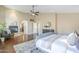Bedroom features a fireplace, access to ensuite, wood floors, high ceilings, and relaxing atmosphere at 768 E Mountain Sky Ave, Phoenix, AZ 85048