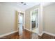 Hallway with hardwood floors provides access to bedrooms and bathrooms at 768 E Mountain Sky Ave, Phoenix, AZ 85048