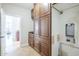 Laundry room featuring wood cabinets and direct access to the main house at 768 E Mountain Sky Ave, Phoenix, AZ 85048