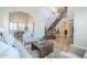 Open-concept living space featuring staircase and dining area views at 768 E Mountain Sky Ave, Phoenix, AZ 85048