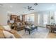 Spacious living room boasts an open floor plan, seamlessly connecting to the kitchen and dining area at 768 E Mountain Sky Ave, Phoenix, AZ 85048