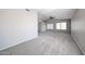 Spacious bedroom featuring neutral carpet, paint, a ceiling fan, and good natural light at 8017 W Eugie Ave, Peoria, AZ 85381