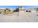 Inviting two-story home with a well-manicured front yard, offering a glimpse of suburban living at 8017 W Eugie Ave, Peoria, AZ 85381