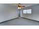 Bedroom features a ceiling fan and a window at 8220 E Montecito Ave, Scottsdale, AZ 85251