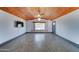 Living room featuring a vaulted wood ceiling and large picture window at 8220 E Montecito Ave, Scottsdale, AZ 85251