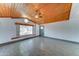Charming living room with vaulted wood ceilings and a large window seat at 8220 E Montecito Ave, Scottsdale, AZ 85251