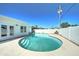 Beautiful backyard pool with white fencing provides privacy and a peaceful retreat at 8220 E Montecito Ave, Scottsdale, AZ 85251