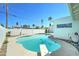 Inviting backyard pool with palm trees and plenty of space for outdoor entertaining and lounging at 8220 E Montecito Ave, Scottsdale, AZ 85251